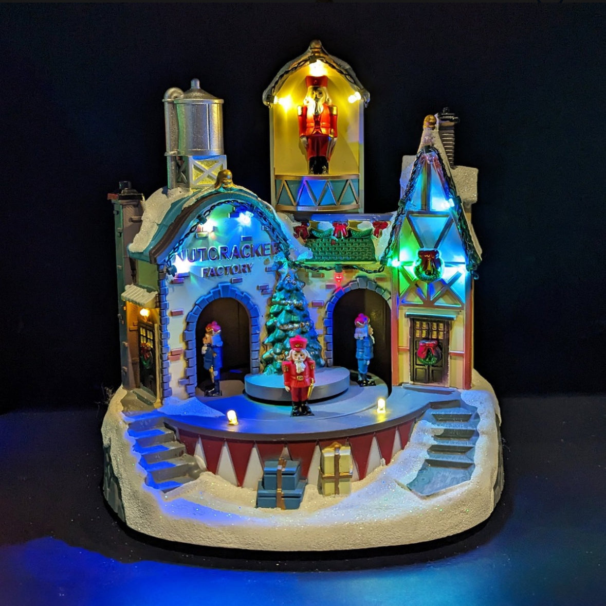Vila Natalina Fábrica de Quebra Nozes Musical Com Luz 22cm